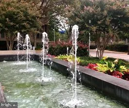 a view of a porch with chairs and a table