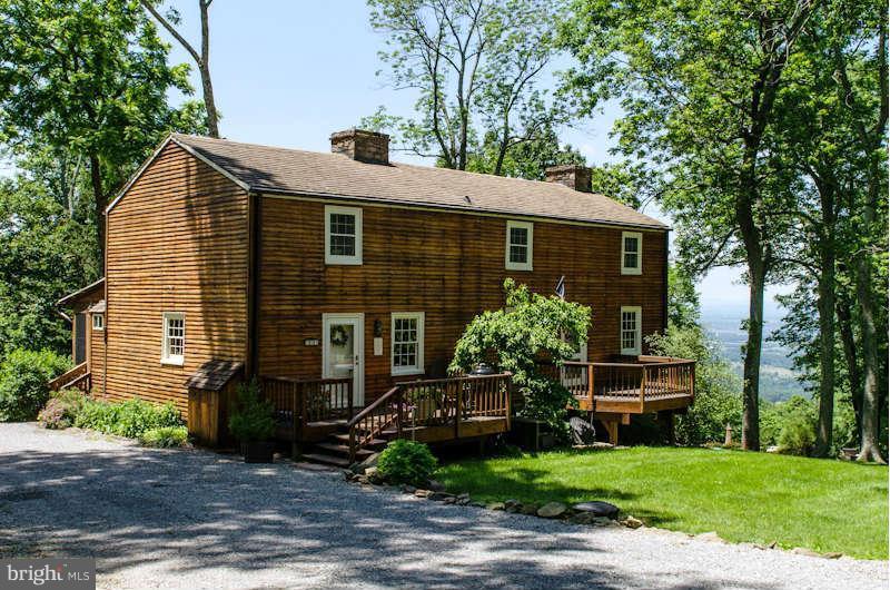 32580 Mt Weather Road Bluemont, VA 20135 - Photo 3 of 29 a front view of a house with garden