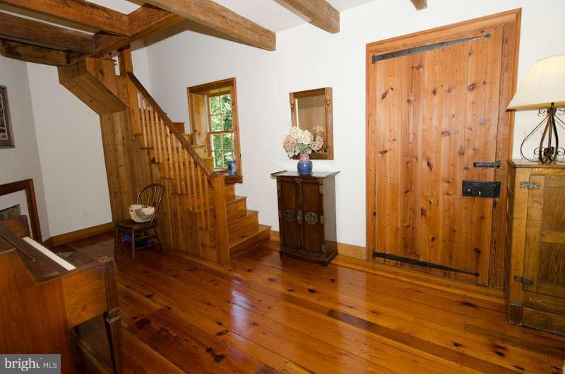 32580 Mt Weather Road Bluemont, VA 20135 - Photo 4 of 29 a view of an entryway with wooden floor and door