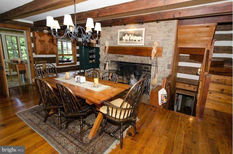 32580 Mt Weather Road Bluemont, VA 20135 - Photo 8 of 29 a view of a dining room with furniture window and wooden floor