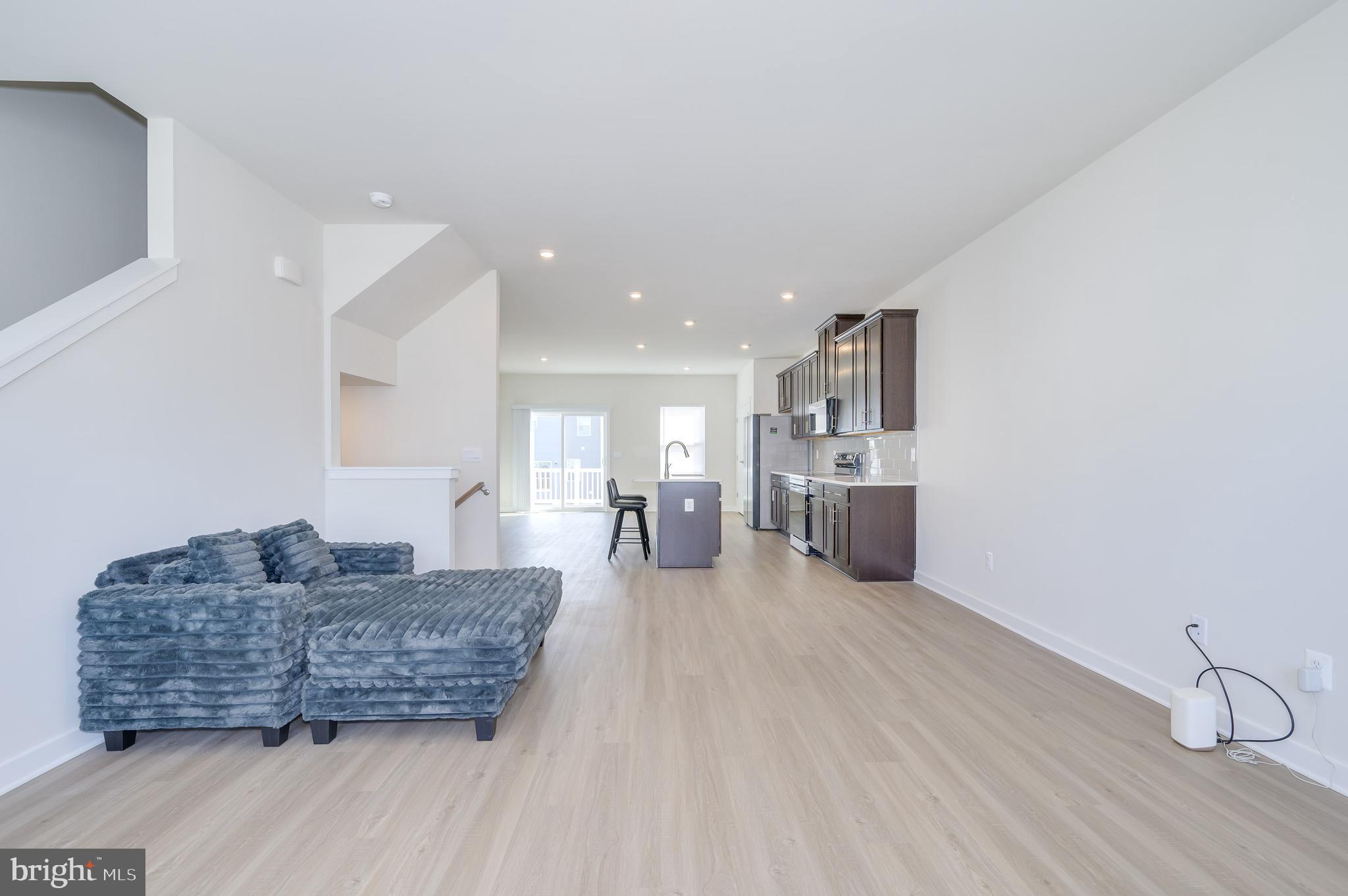 14 Trotting Road Inwood, WV 25428 - Photo 25 of 53 a living room with furniture and kitchen view