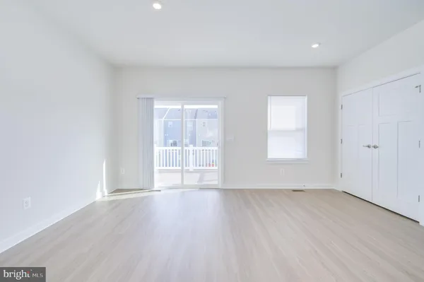 a empty closet with white paint