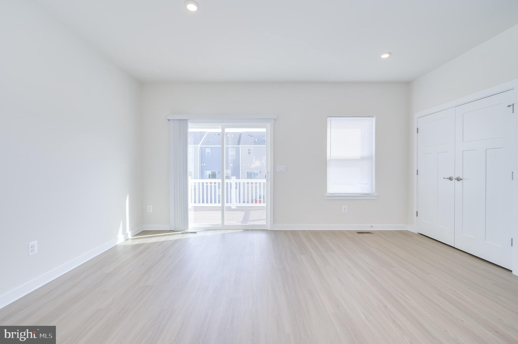 14 Trotting Road Inwood, WV 25428 - Photo 36 of 53 wooden floor in an empty room with a window
