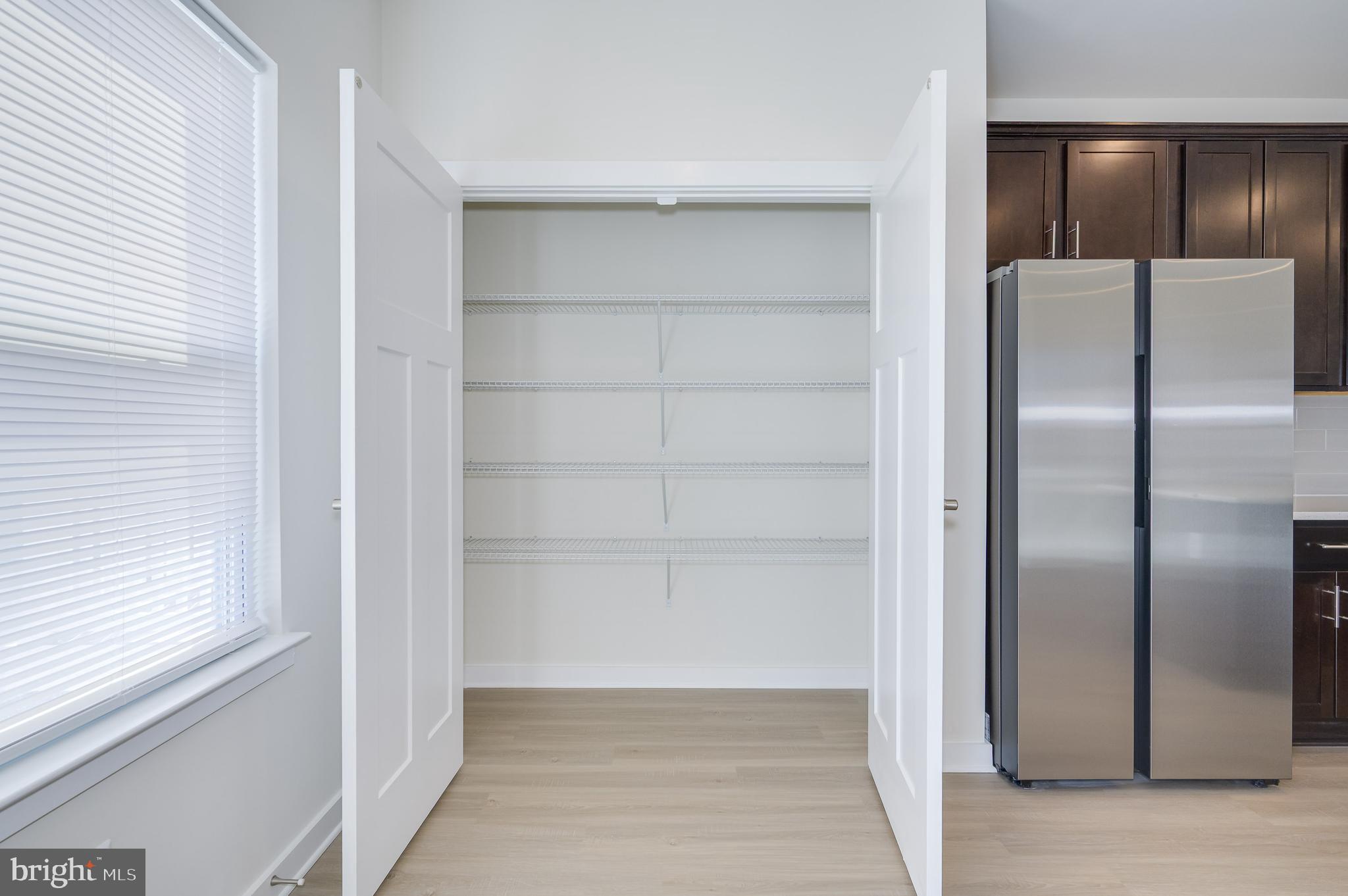 14 Trotting Road Inwood, WV 25428 - Photo 37 of 53 a empty closet with white paint