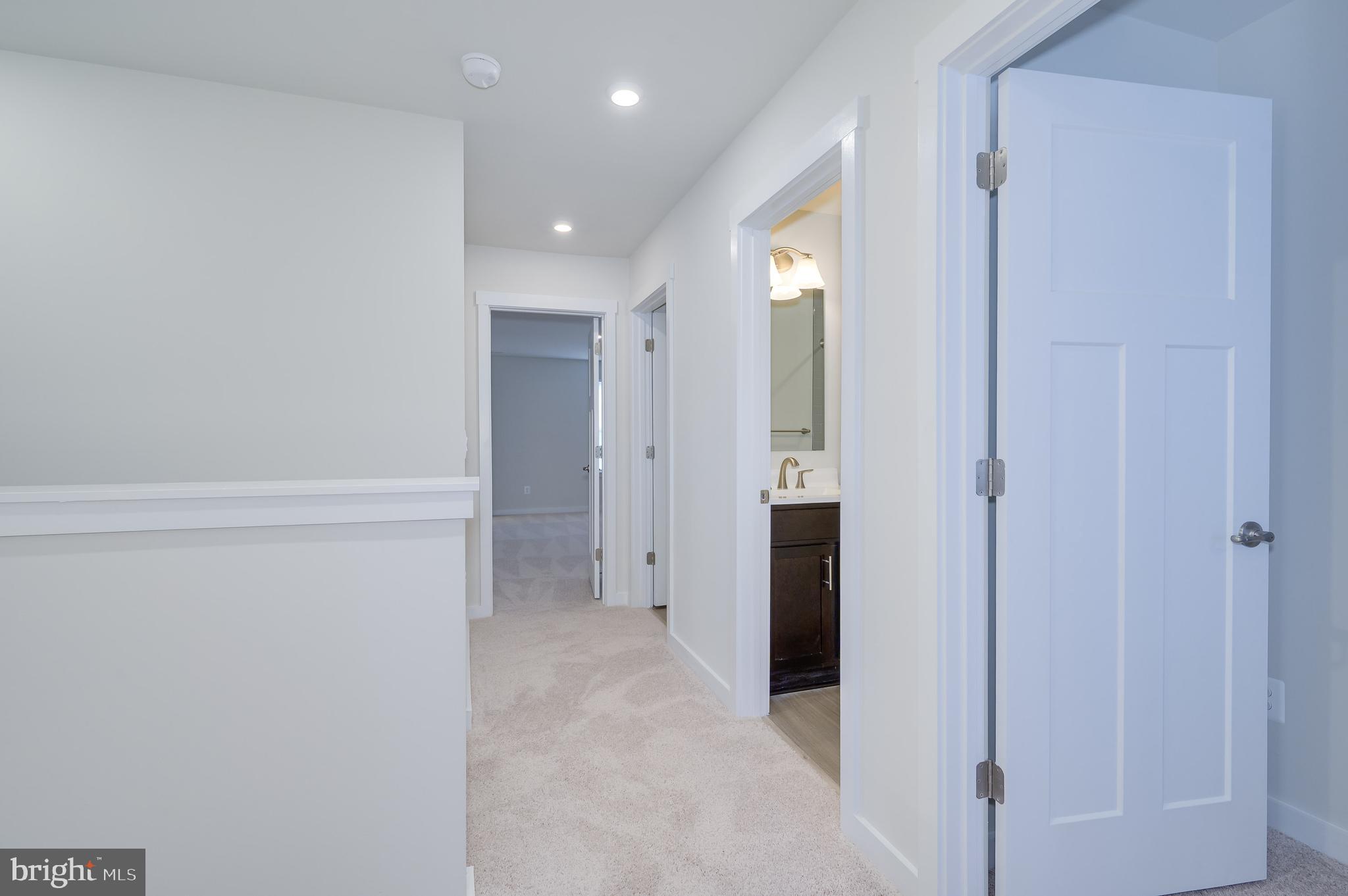 14 Trotting Road Inwood, WV 25428 - Photo 39 of 53 a view of a hallway with an entryway door