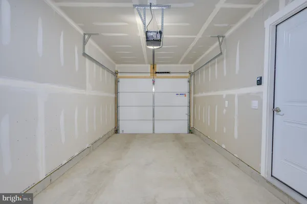 a view of a hallway with staircase