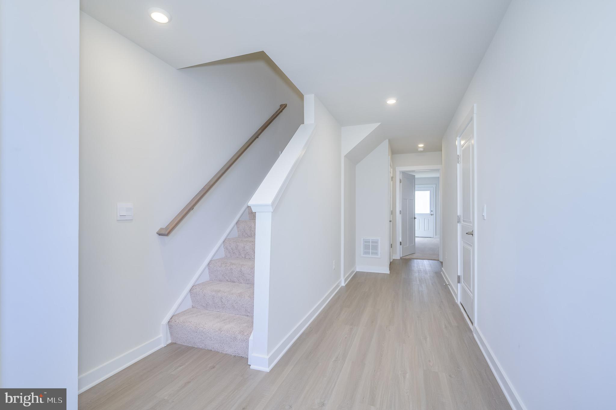 14 Trotting Road Inwood, WV 25428 - Photo 8 of 53 a view of a hallway with staircase