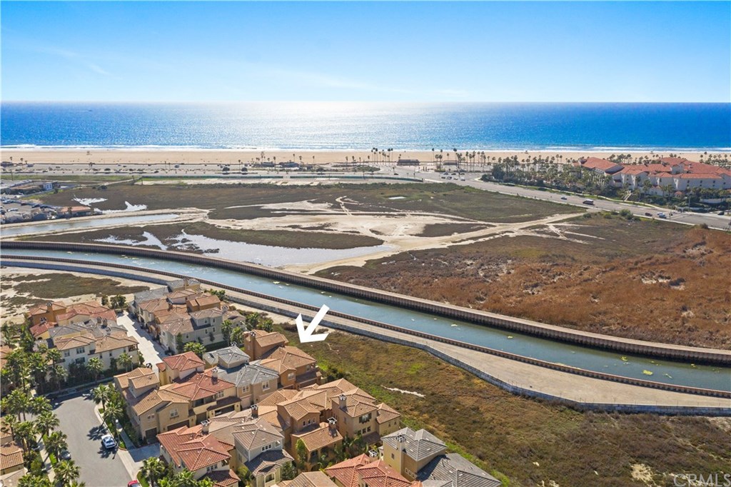 Prime lot with panoramic ocean and city light views.