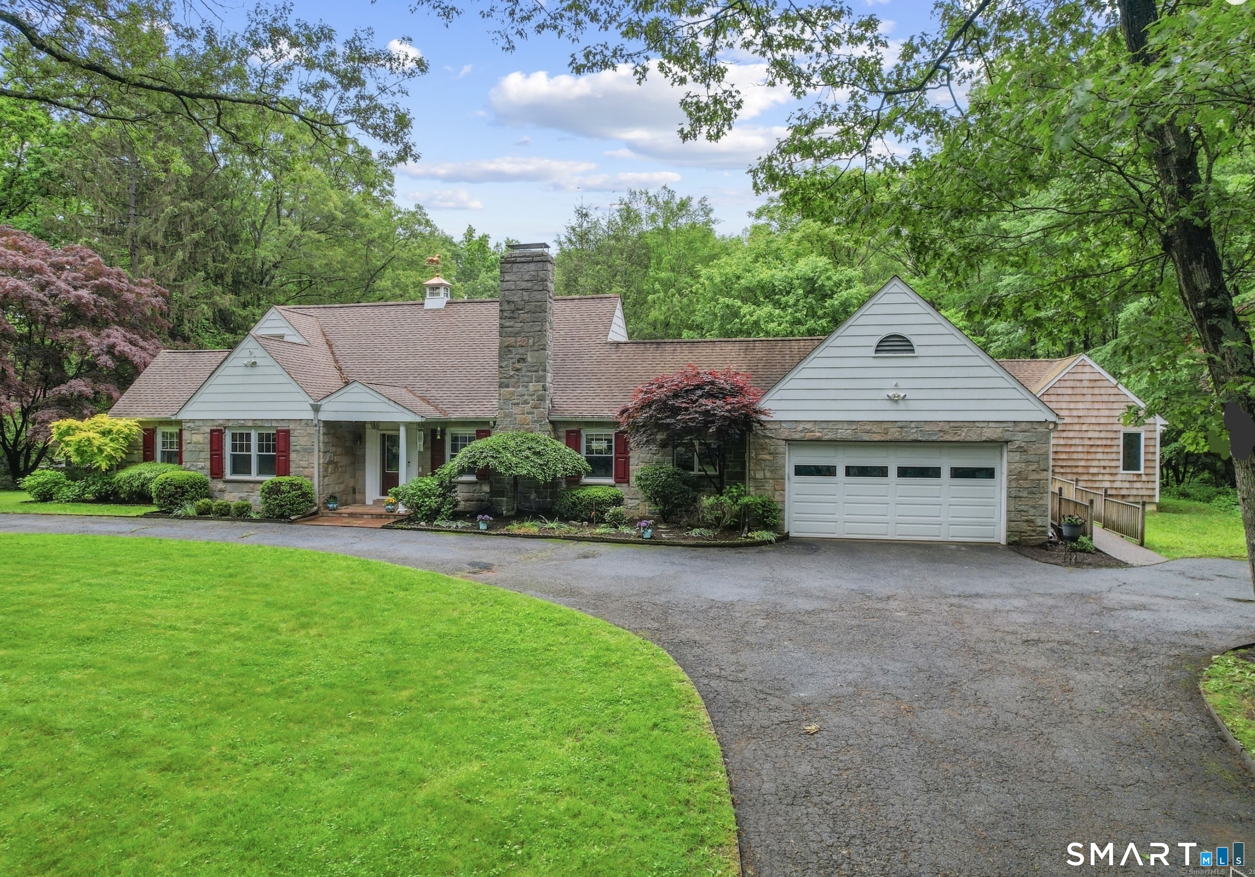 190 East Rocks Road Norwalk, CT 06851 - Photo 2 of 38 a front view of a house with yard patio and green space