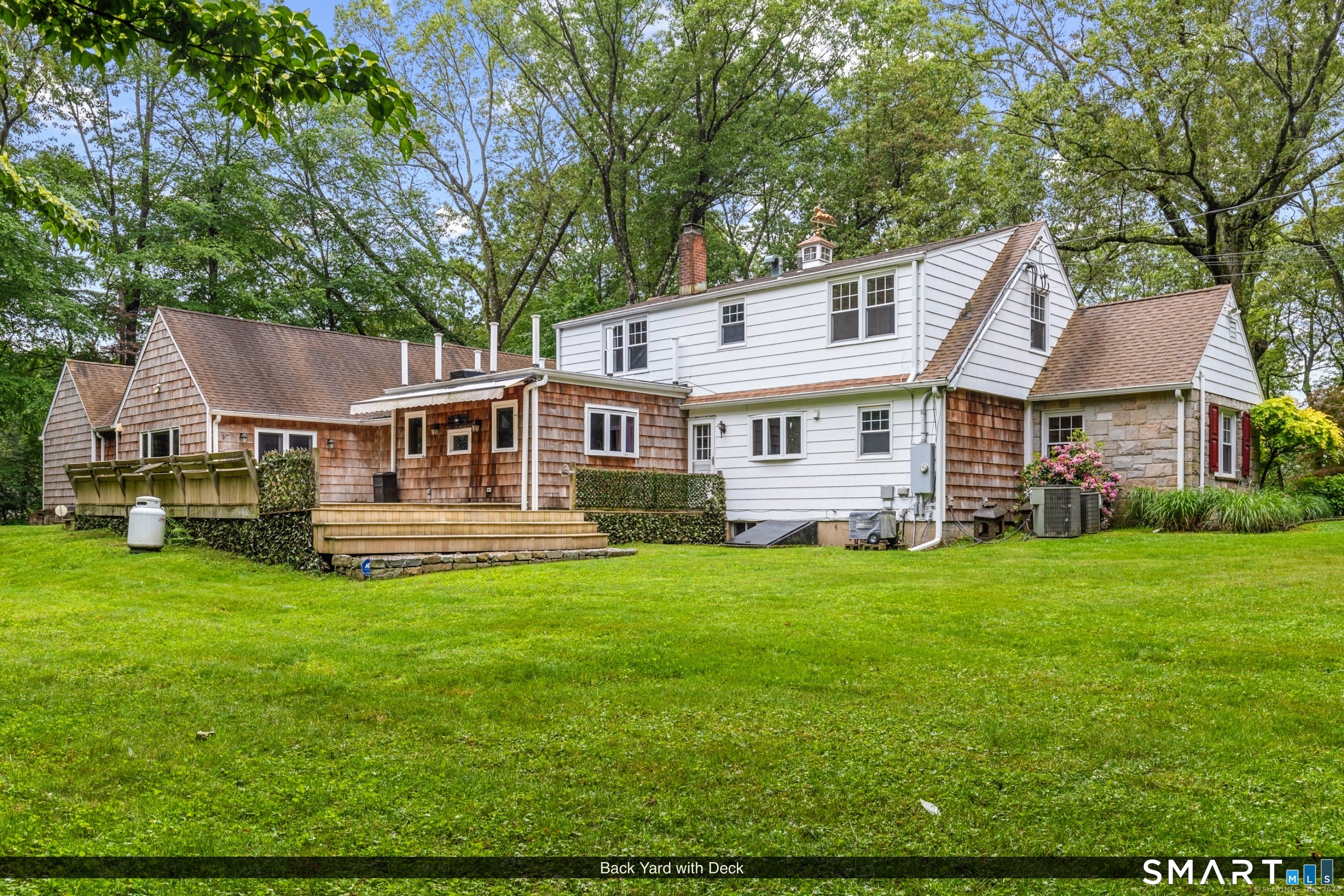 190 East Rocks Road Norwalk, CT 06851 - Photo 34 of 38 a view of a house with a yard