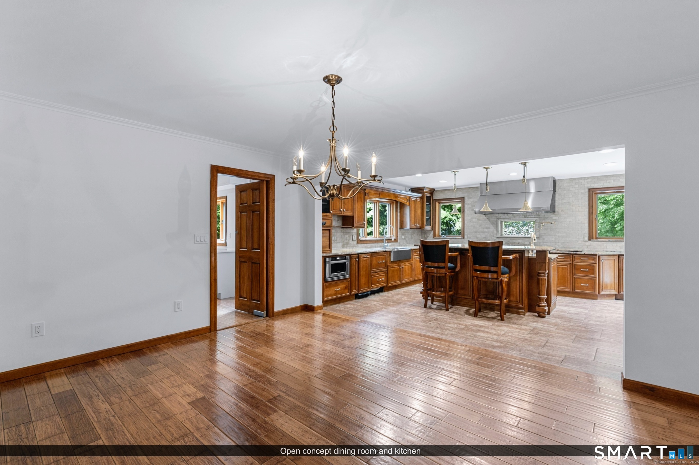 190 East Rocks Road Norwalk, CT 06851 - Photo 7 of 38 a living room with furniture and kitchen view