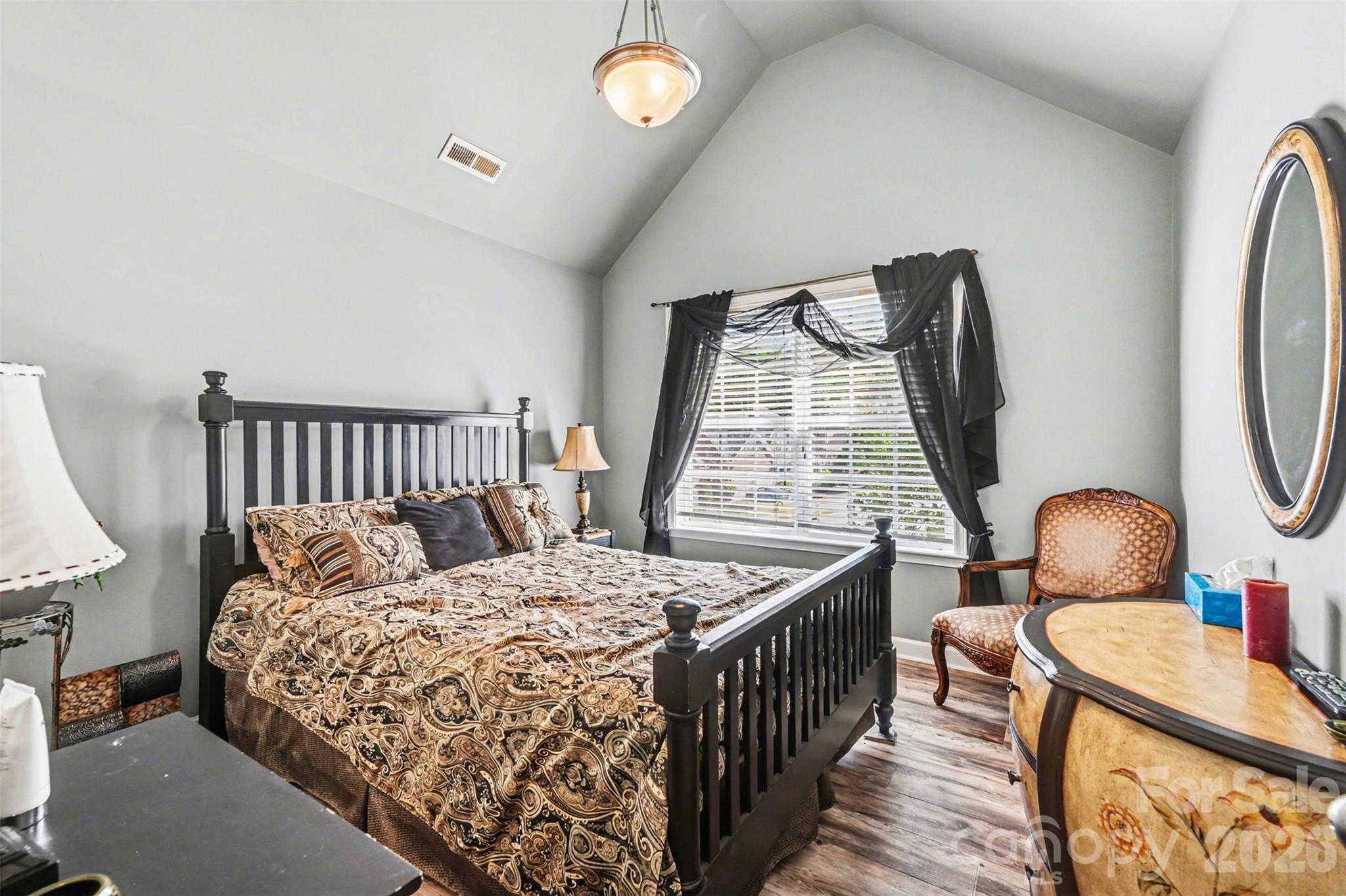 10812 Clark Street Davidson, NC 28036 - Photo 16 of 32 a bedroom with bed and a window