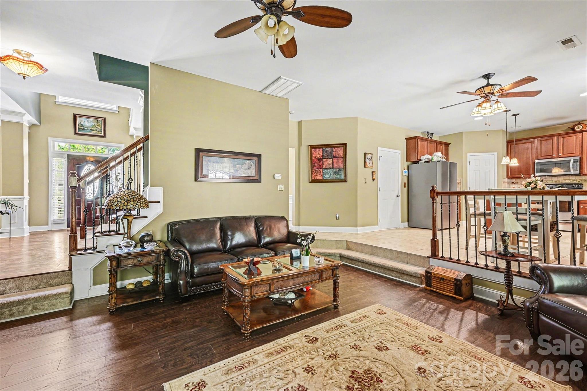 10812 Clark Street Davidson, NC 28036 - Photo 9 of 32 a living room with furniture and wooden floor