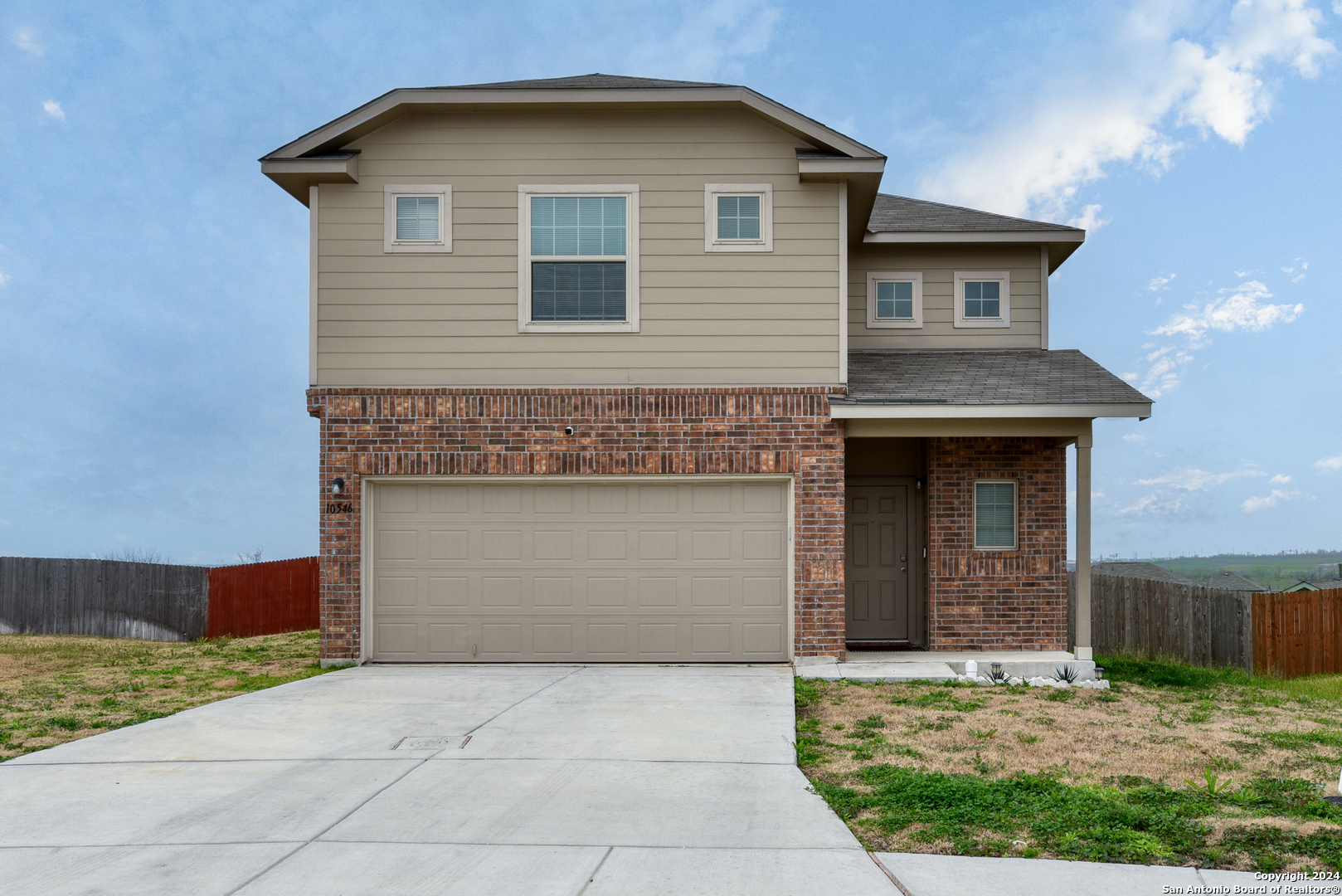 10546 Midsummer Meadow Converse, TX 78109 - Photo 18 of 18 a front view of a house with garden