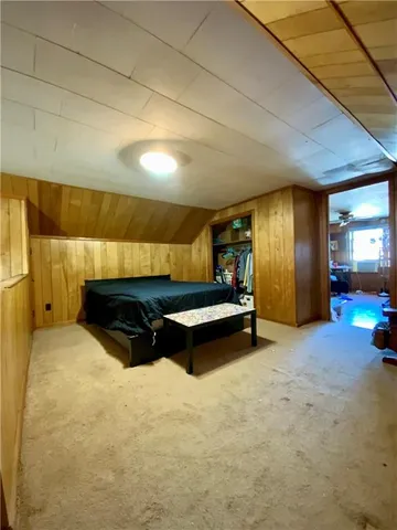 a living room with a table and a couch