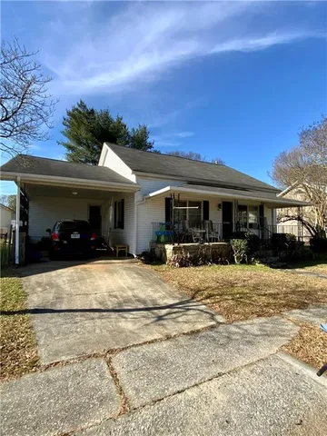 a view of a house with outdoor space and windows