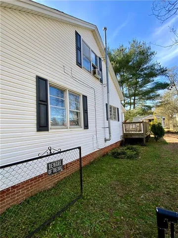 a house view with a garden space