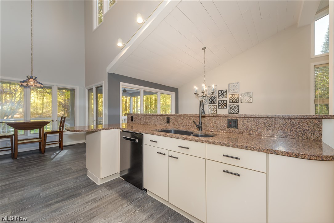 1049 North Medina Line Road Akron, OH 44333 - Photo 10 of 35 Breakfast bar separates the dining area from the kitchen.