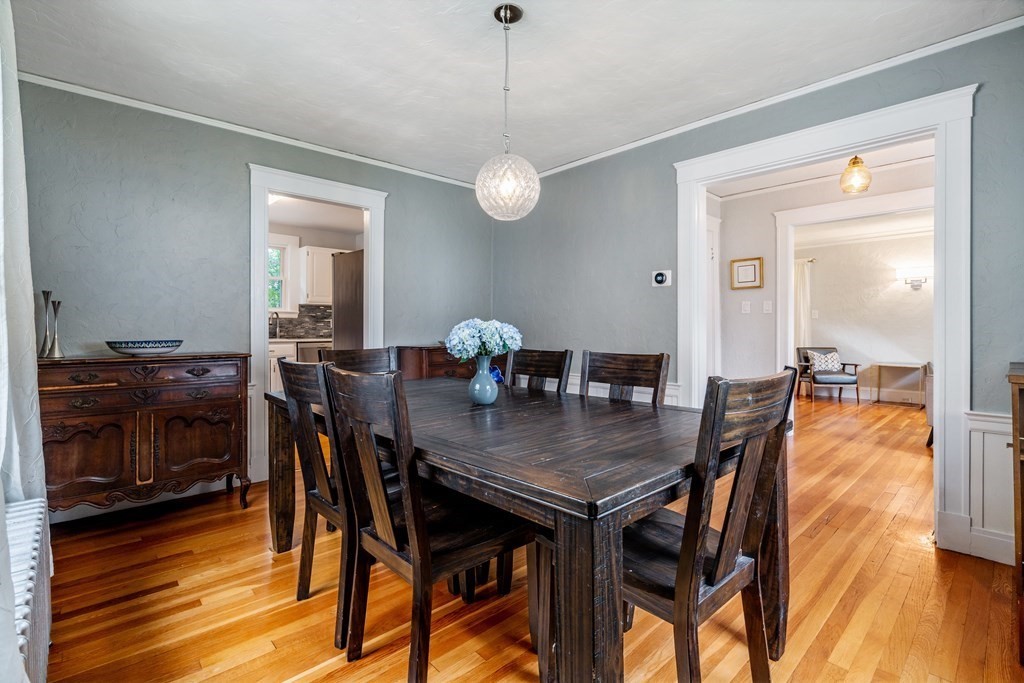 175 Florence Road Waltham, MA 02453 - Photo 8 of 24 a view of a dining room with furniture and wooden floor
