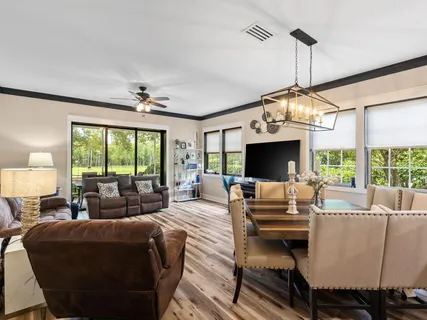 a bathroom with a double vanity sink mirror and vanity