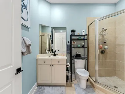 a view of an outdoor dining space with a table and chairs