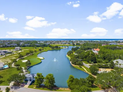 a view of a lake with a big yard
