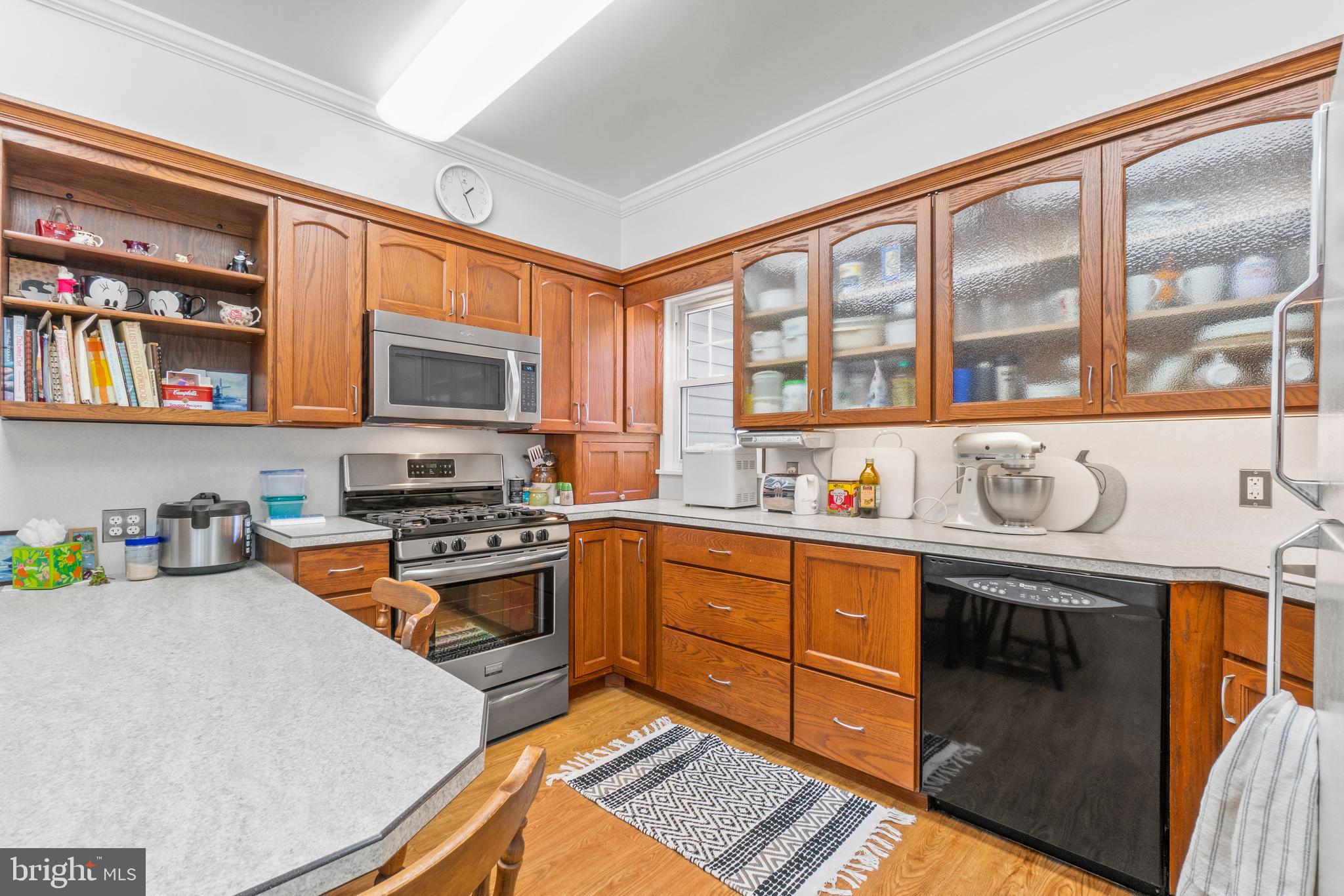 509 Academy Road Catonsville, MD 21228 - Photo 23 of 37 Gas range for cooking accented by glass front cabs