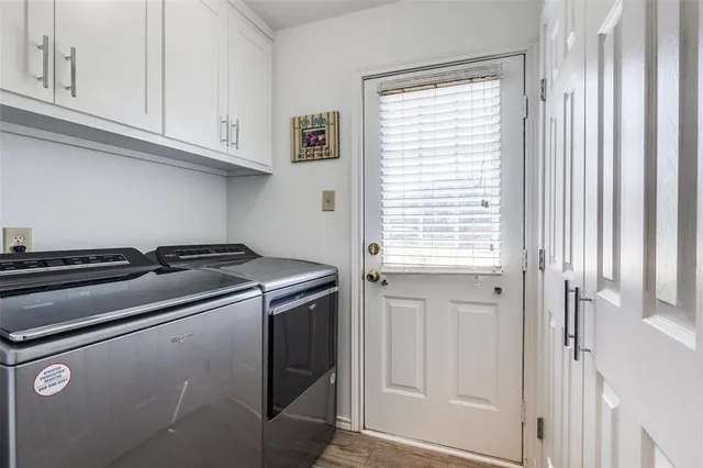 a view of a kitchen with appliances