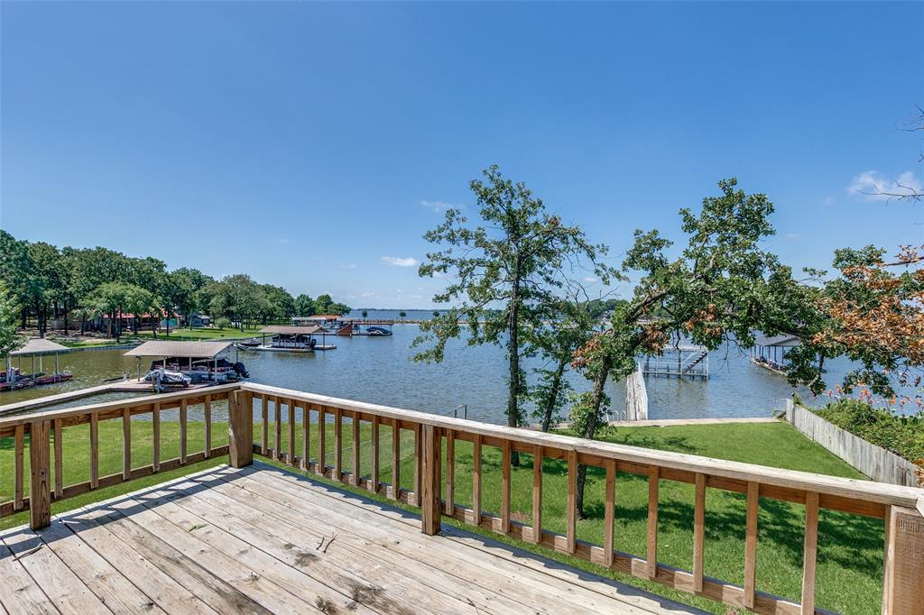 162 Aztec Drive Mabank, TX 75156 - Photo 19 of 30 a view of a balcony with wooden floor