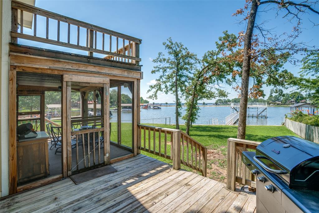 162 Aztec Drive Mabank, TX 75156 - Photo 22 of 30 a view of a deck with wooden floor and outer view
