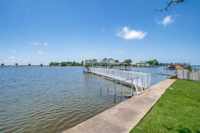 a view of a lake with a city