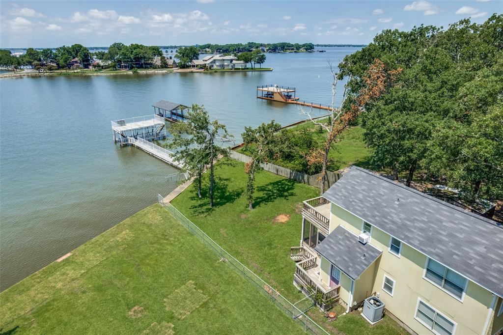 162 Aztec Drive Mabank, TX 75156 - Photo 27 of 30 an aerial view of a house with outdoor space and lake view