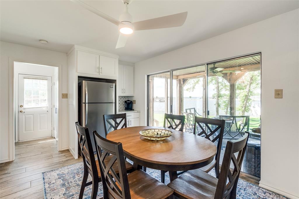 162 Aztec Drive Mabank, TX 75156 - Photo 10 of 30 a view of a dining room with furniture window and wooden floor