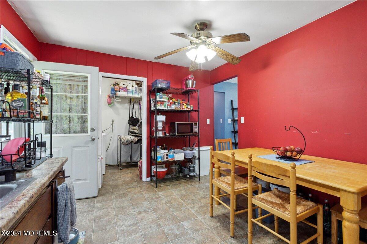 23 Middlesex Road Matawan, NJ 07747 - Photo 8 of 17 a dining room with furniture and chandelier fan