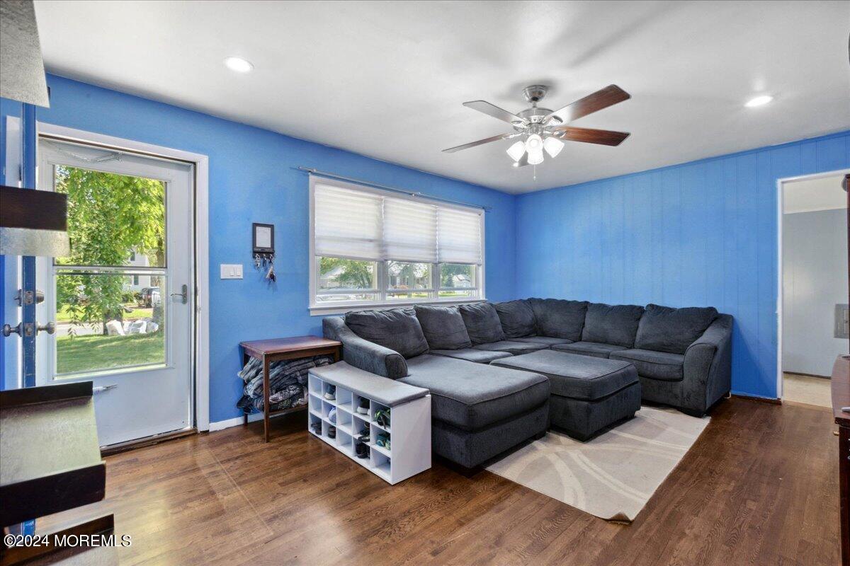 23 Middlesex Road Matawan, NJ 07747 - Photo 9 of 17 a living room with furniture and a large window