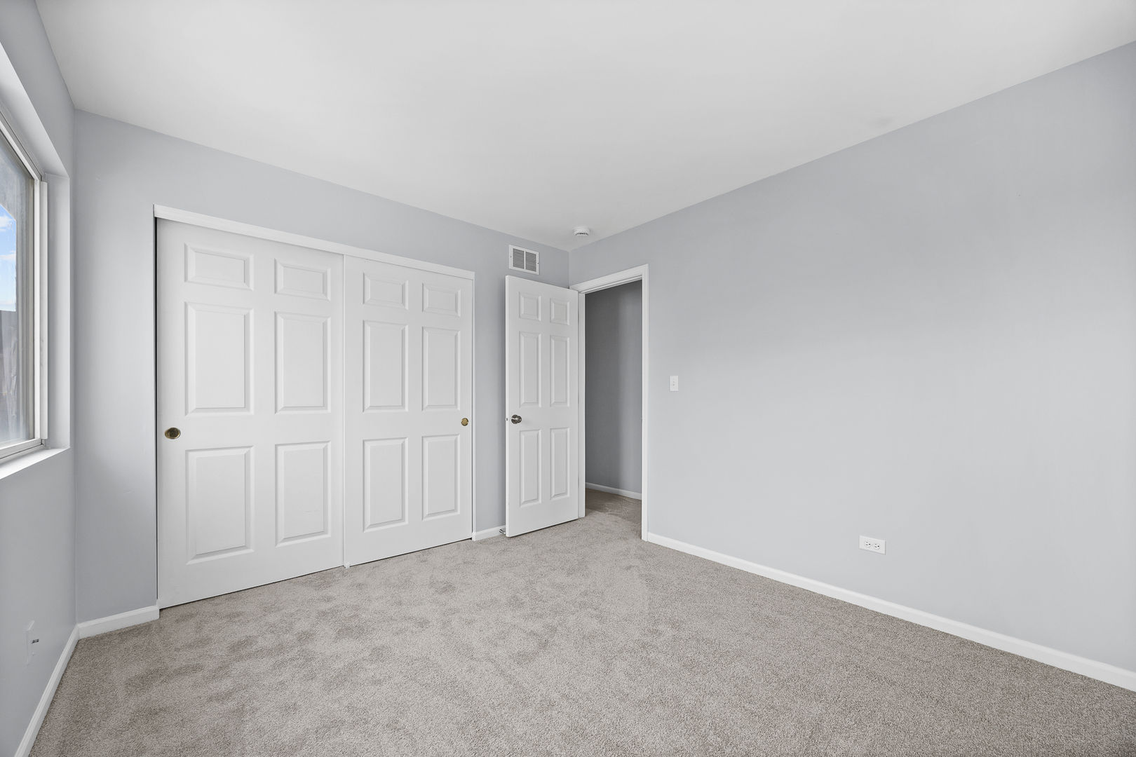 631 Kingsbrooke Crossing Bolingbrook, IL 60440 - Photo 28 of 40 a view of an empty room and closet area