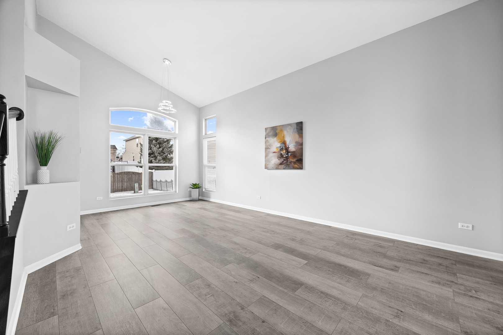 631 Kingsbrooke Crossing Bolingbrook, IL 60440 - Photo 8 of 40 wooden floor in an empty room with a window