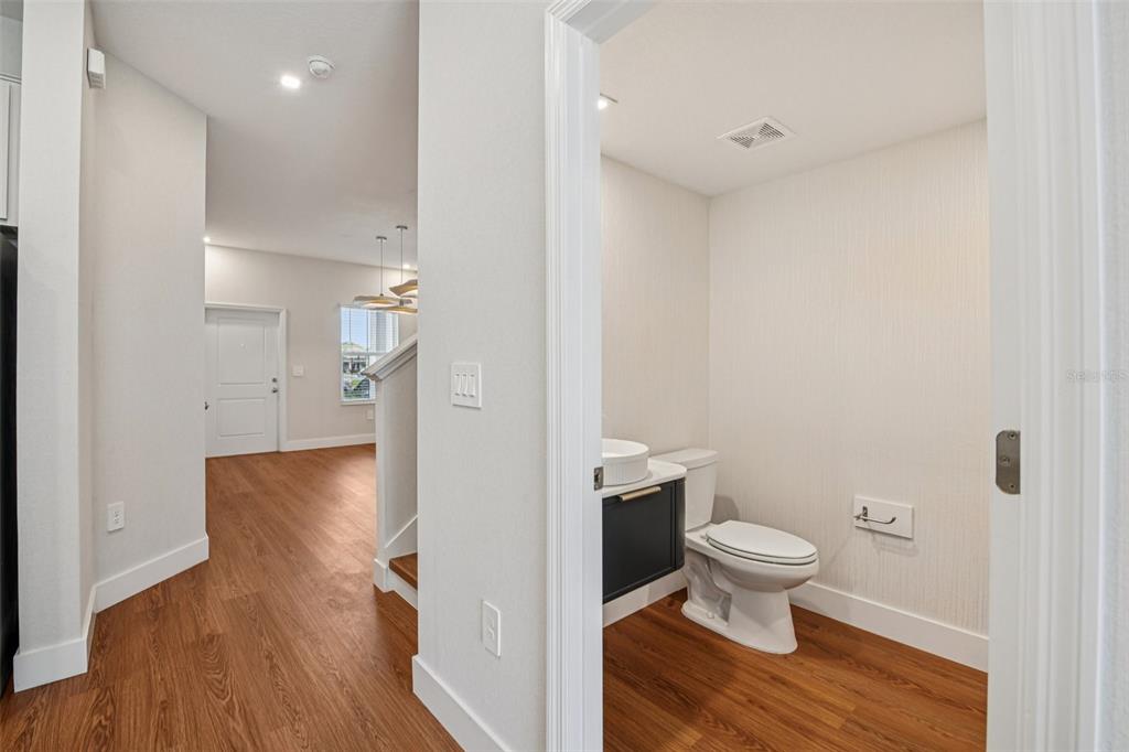 6159 Peaceful Pk Way Clermont, FL 34714 - Photo 22 of 43 a view of bathroom and wooden floor