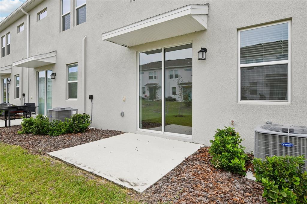 6159 Peaceful Pk Way Clermont, FL 34714 - Photo 40 of 43 a front view of a house with a yard