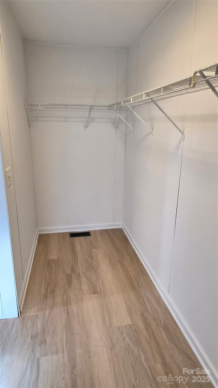 680 Tirzah Church Road Lancaster, SC 29720 - Photo 11 of 25 a view of a room with wooden floor