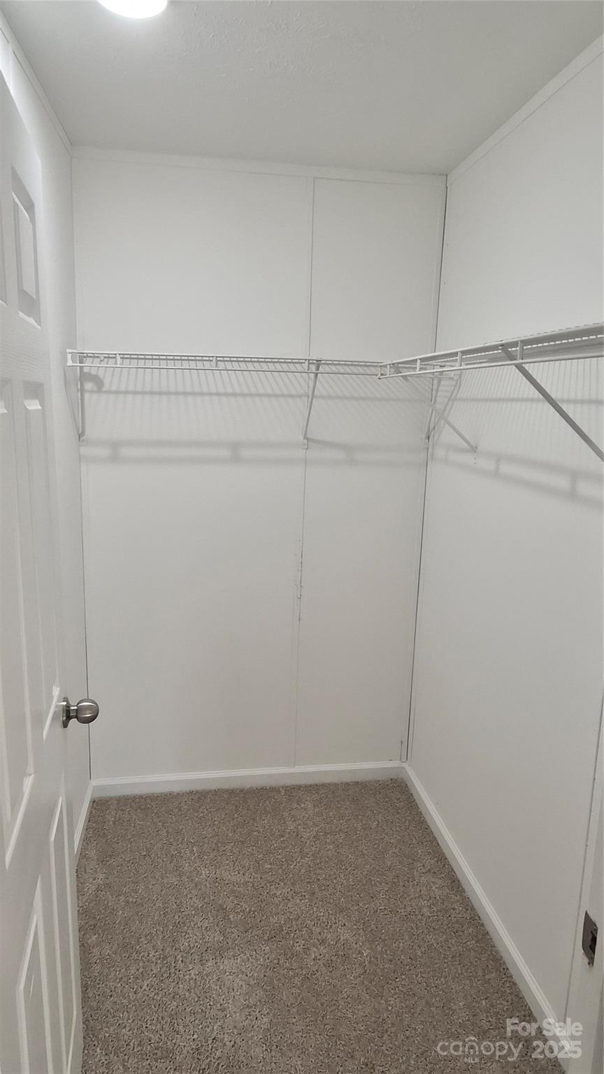 680 Tirzah Church Road Lancaster, SC 29720 - Photo 17 of 25 a view of a room with racks on the wall