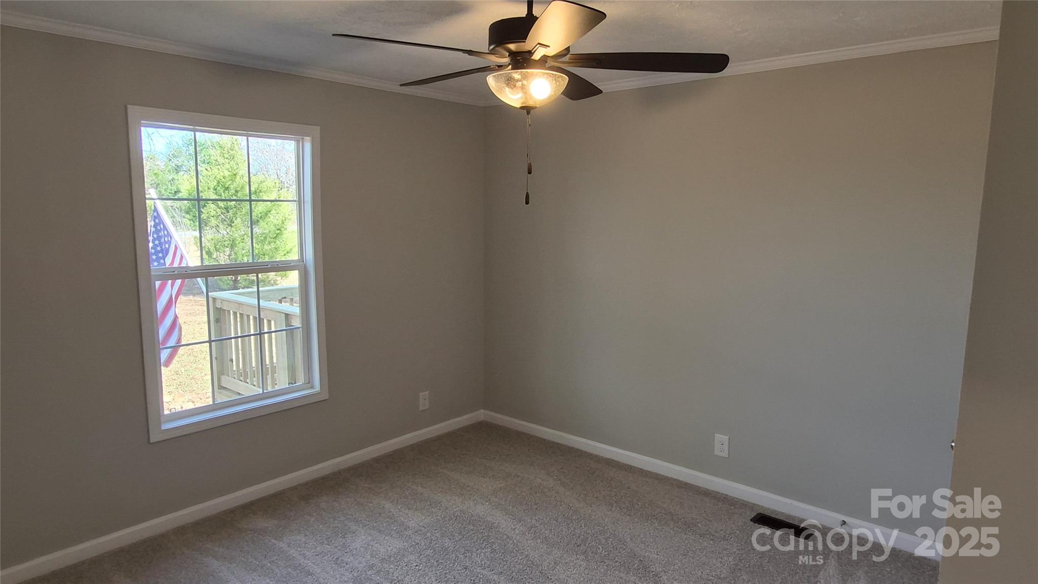 680 Tirzah Church Road Lancaster, SC 29720 - Photo 20 of 25 a view of an empty room with a window