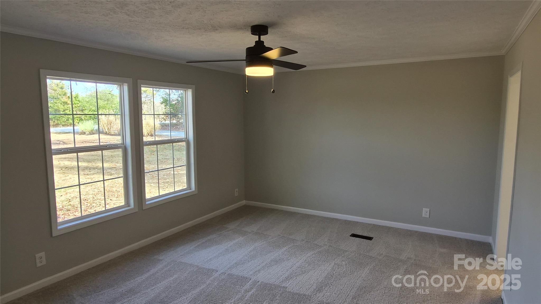 680 Tirzah Church Road Lancaster, SC 29720 - Photo 7 of 25 a view of an empty room with a window