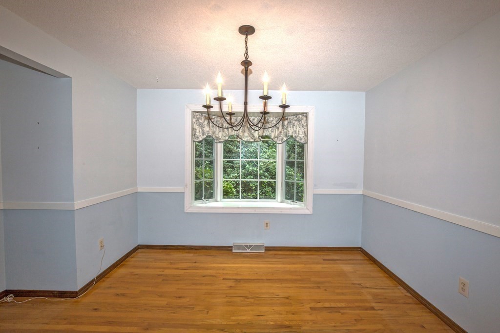 477 Wolf Swamp Road Longmeadow, MA 01106 - Photo 12 of 35 a view of a livingroom with a window