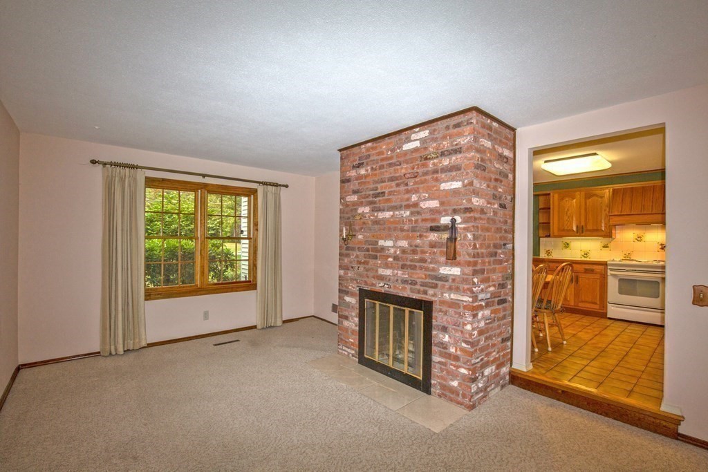 477 Wolf Swamp Road Longmeadow, MA 01106 - Photo 18 of 35 an empty room with windows & mountain view