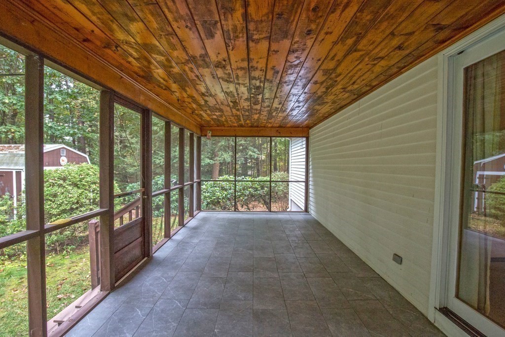 477 Wolf Swamp Road Longmeadow, MA 01106 - Photo 20 of 35 a view of a porch and garden