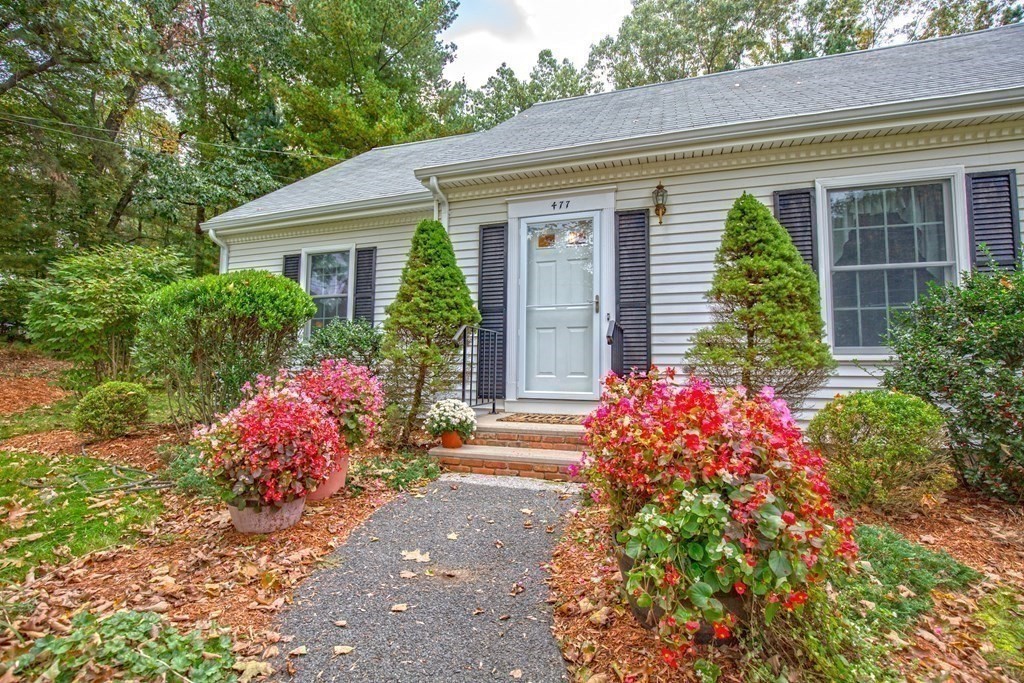 477 Wolf Swamp Road Longmeadow, MA 01106 - Photo 2 of 35 a front view of a house with garden