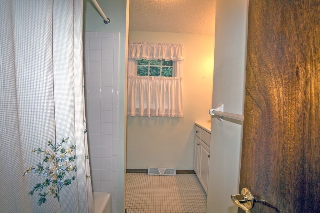 477 Wolf Swamp Road Longmeadow, MA 01106 - Photo 22 of 35 a view of an entryway with a flower pot