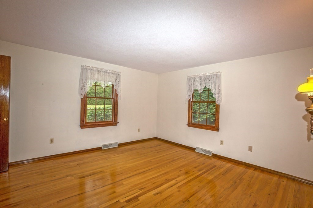 477 Wolf Swamp Road Longmeadow, MA 01106 - Photo 24 of 35 an empty room with windows