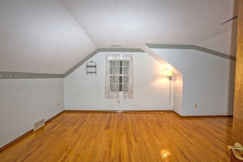 477 Wolf Swamp Road Longmeadow, MA 01106 - Photo 32 of 35 a view of empty room with wooden floor